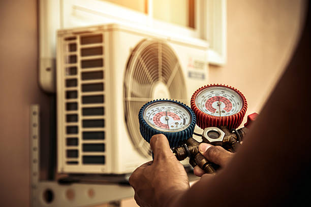 Professional Hvac technician working in Farmington, AR
